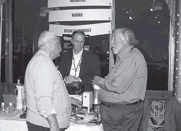 Mike Killeen, center, of Diversitech and Chuck North, right of Northway Marketers.